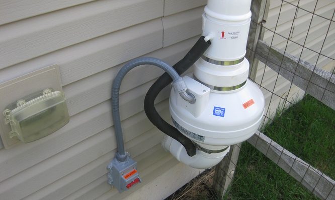 Radon mitigation system fan